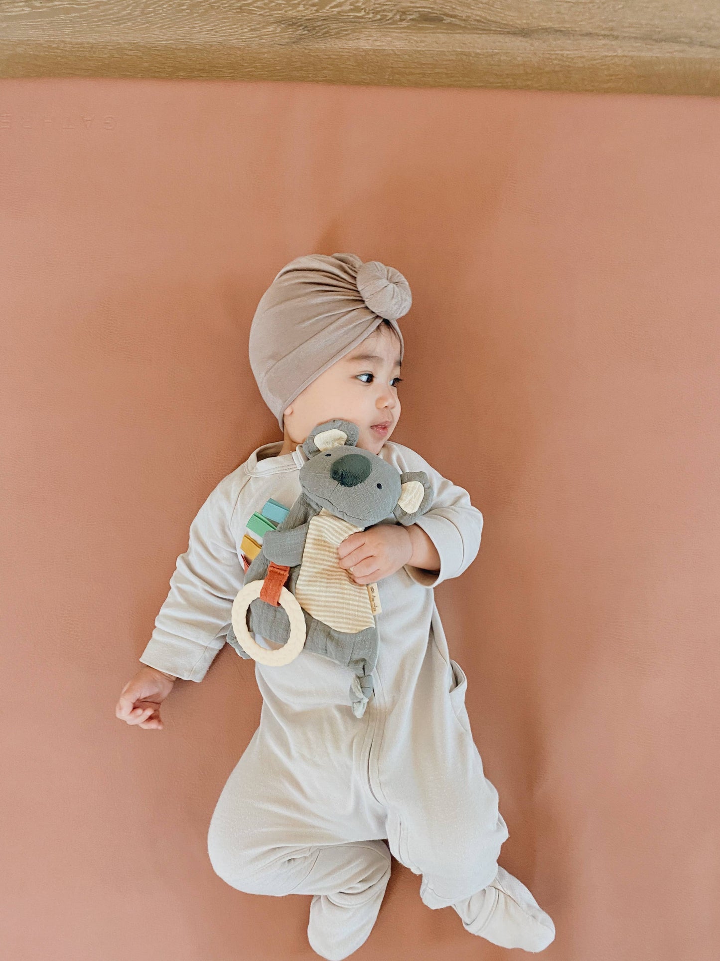 Bitzy Crinkle™ Dino Sensory Toy with Teether